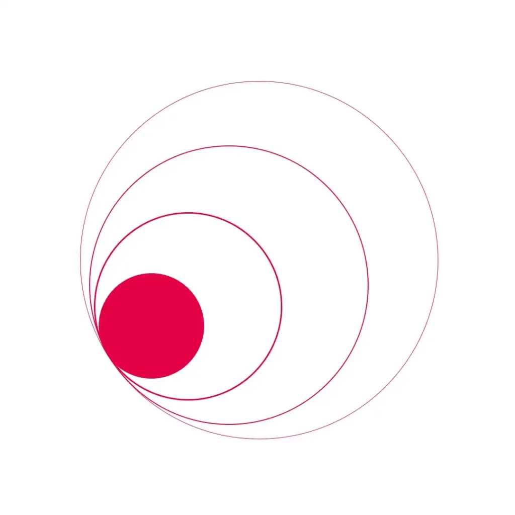 A circle with a red dot in the middle.