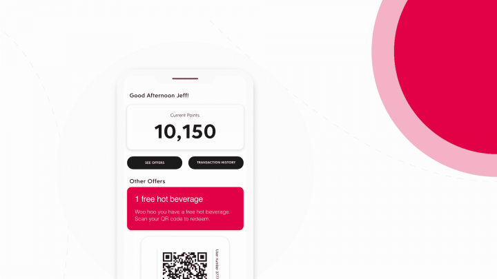 A mobile loyalty app with a qr code on it for a free hot beverage.
